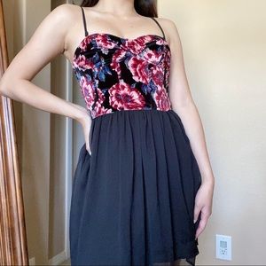 Black and floral mini dress with corset and spaghetti straps